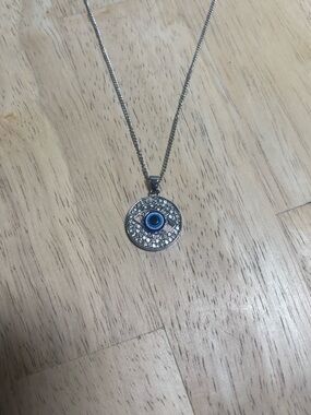 Silver Evil Eye Pendant Necklace with Blue Accent